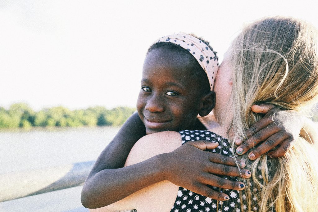 Mother and daughter embracing