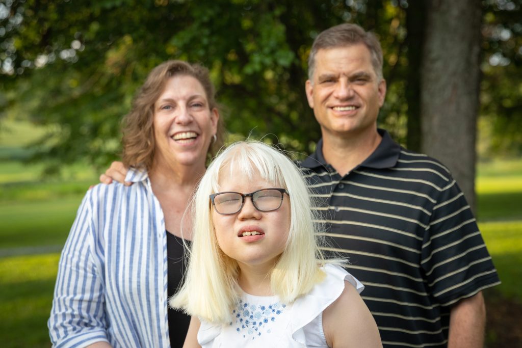 Helping Cate SEE | An image of Cate Wiley and her parents, Peggy and Bruce Wiley
