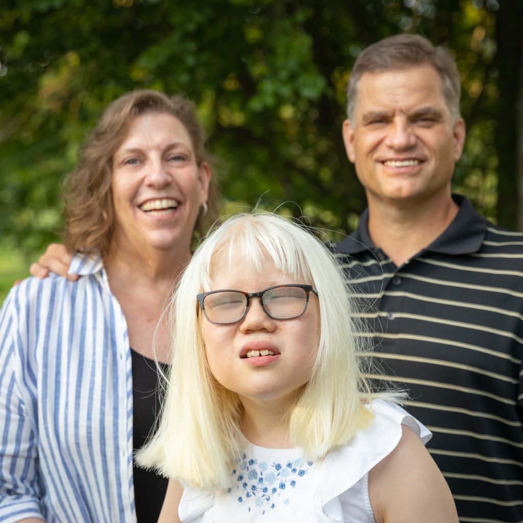 Helping Cate SEE | An image of Cate Wiley and her parents, Peggy and Bruce Wiley