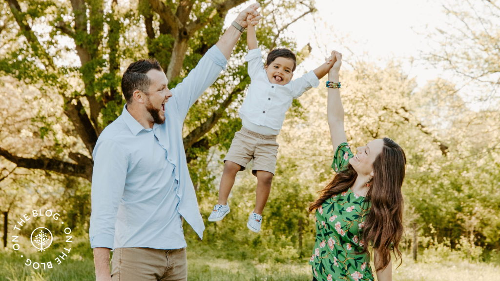 Show Hope Medical Care grant recipient family holding their son up in the air