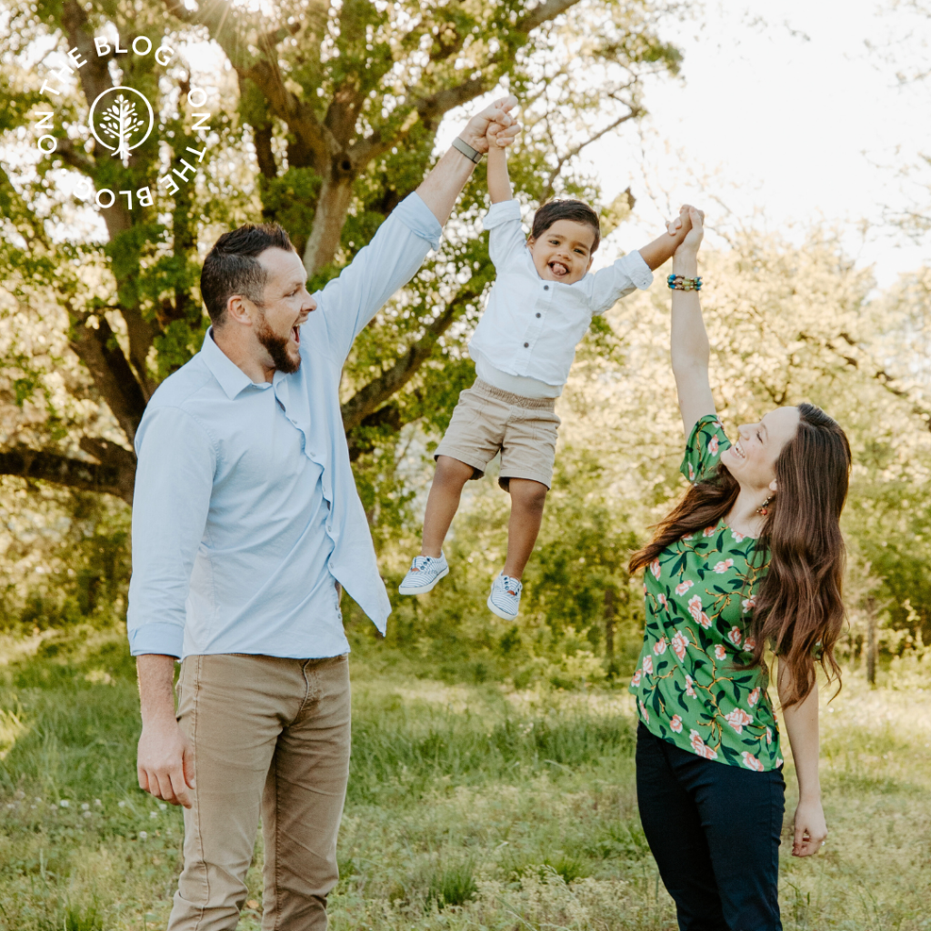 Show Hope Medical Care grant recipient family holding their son up in the air