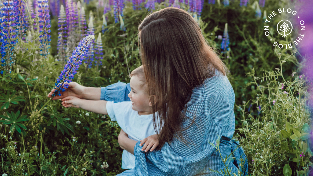 mom and child in a field