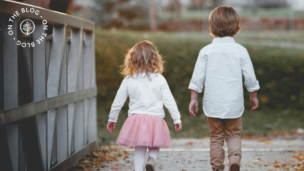 Boy and girl walking outside