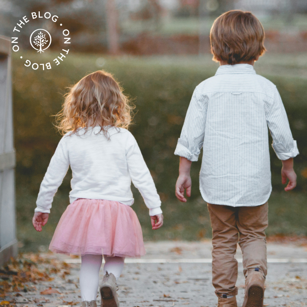 Boy and girl walking outside